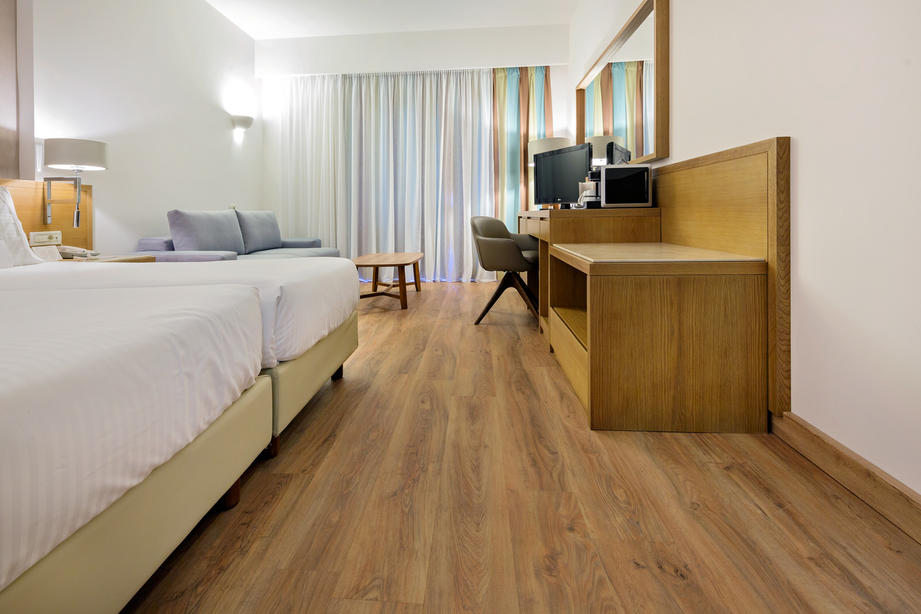 Tommy Miah’s Raj Hotel Chooses Click-Lock Vinyl Flooring from Tan Truong Minh Interior